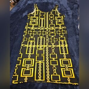 Absolutely it womens dress. Black and yellow 3X